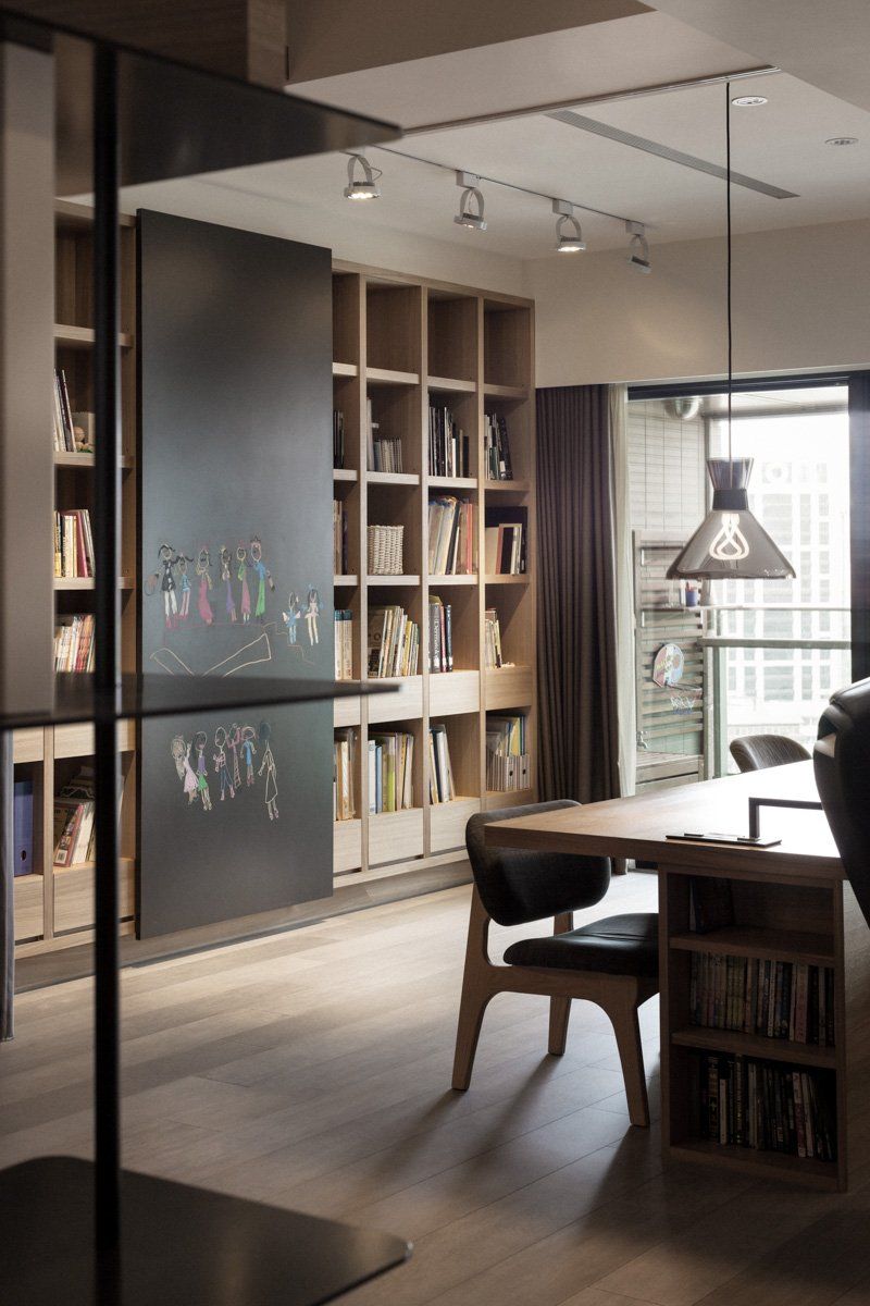 Spacious Open-Concept Home Office Using Extensive Wood Throughout